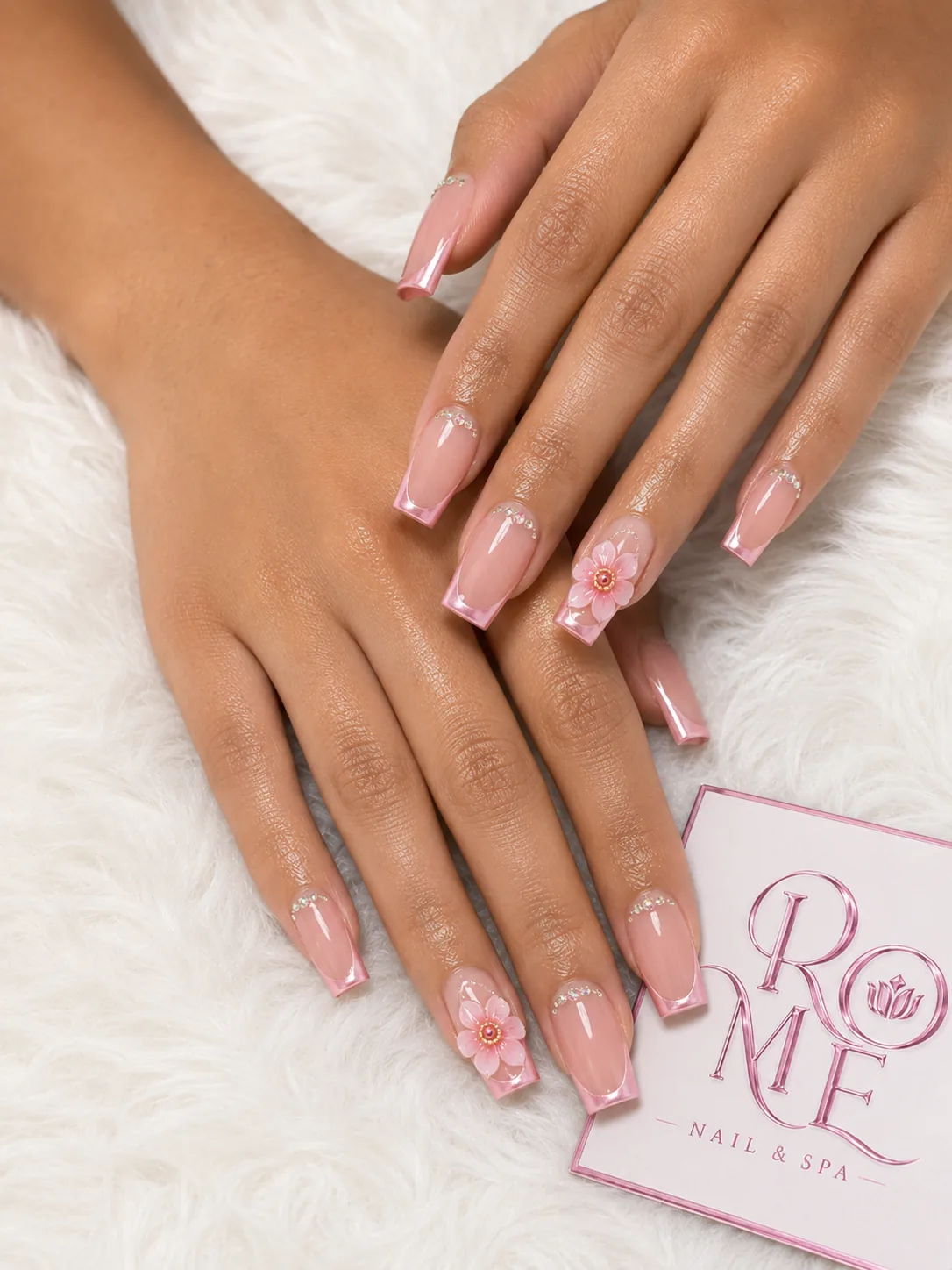 Coral almond nails with raised floral nail art by Rome Nails Spa