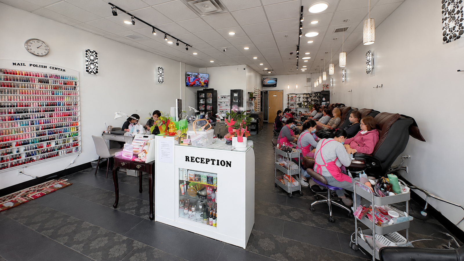 Wide reception and salon view at Rome Nails Spa